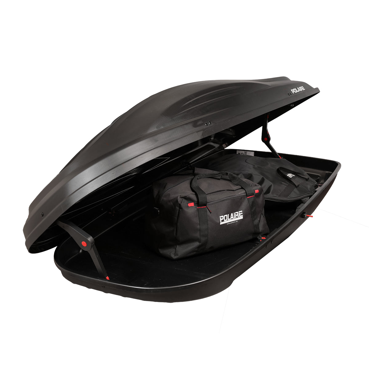 Coffre de toit Polaire Inspiration 480L ouvert avec bagages – ouverture bilatérale